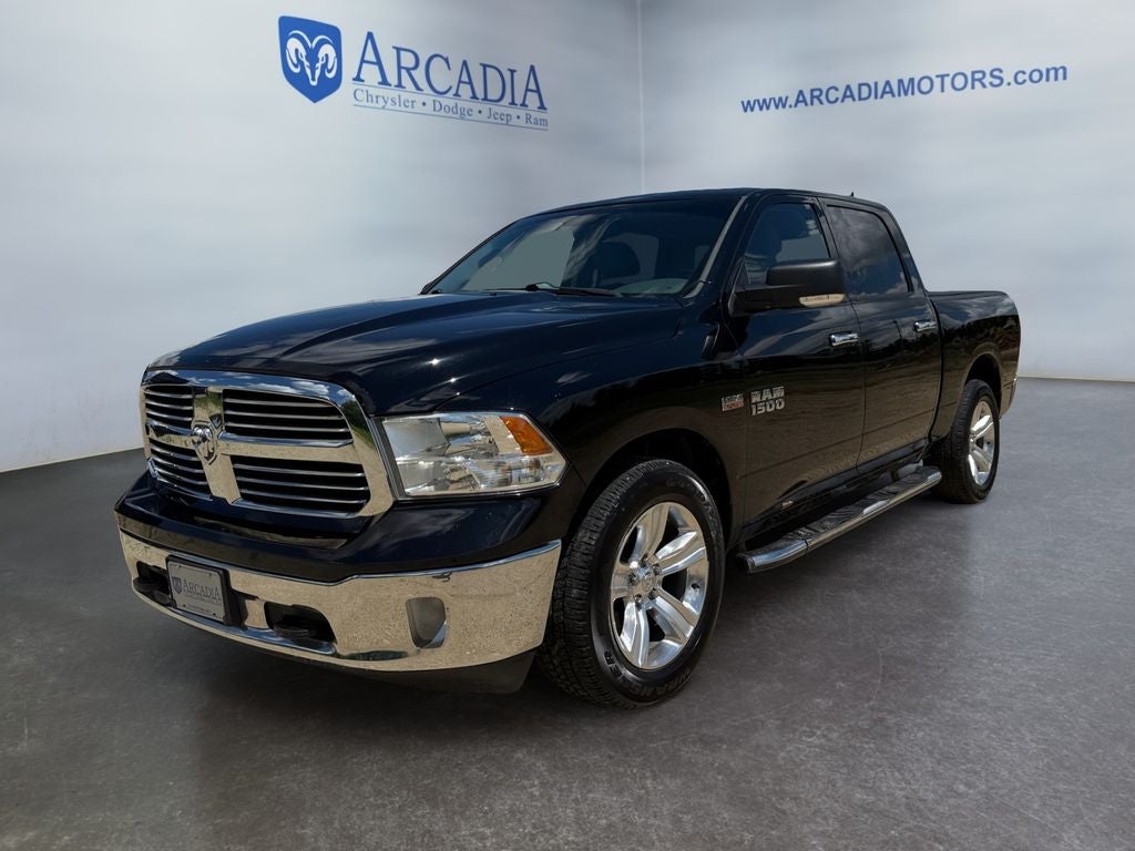 2014 RAM 1500 Big Horn in Black Clearcoat — front three-quarter view