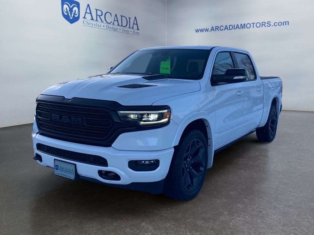 2021 RAM 1500 Limited in Ivory White Tri-Coat Pearlcoat — front three-quarter view
