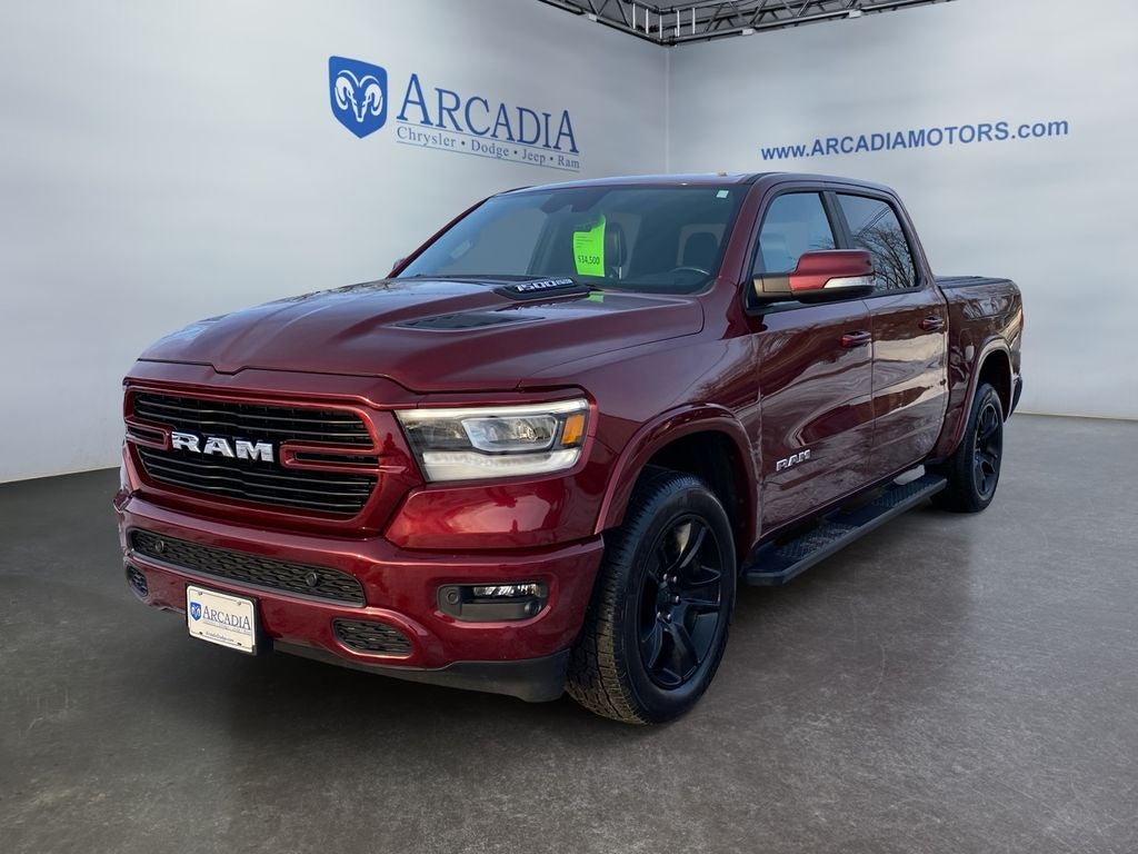 2022 RAM 1500 Laramie in Delmonico Red Pearlcoat — front three-quarter view