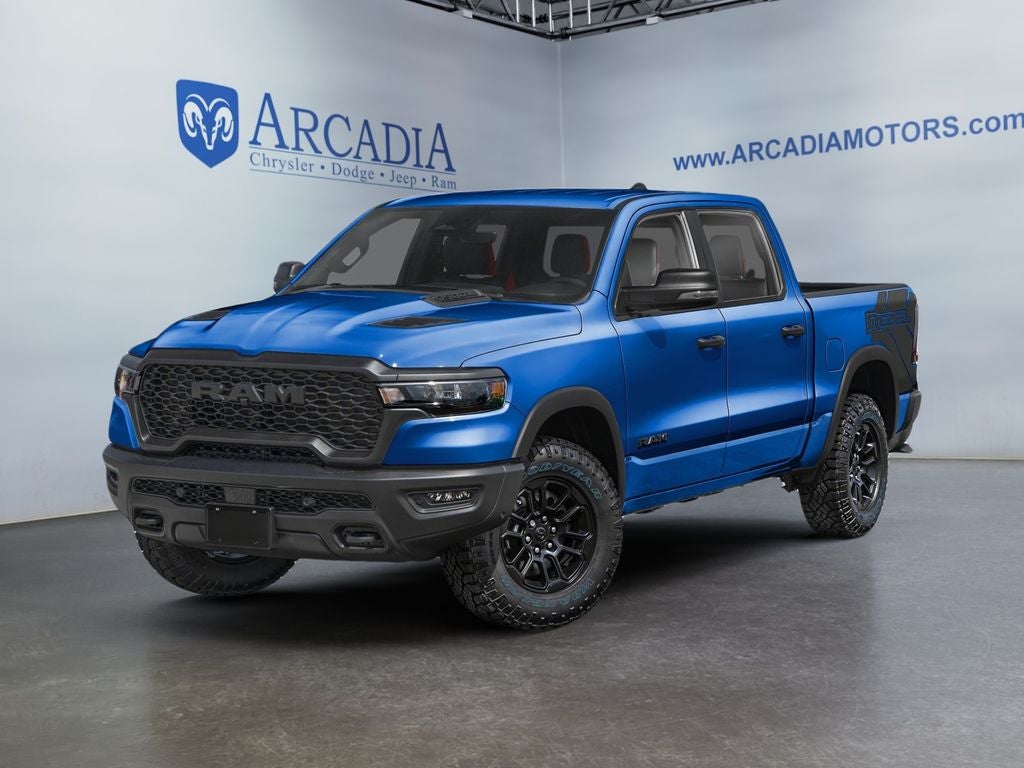 2026 RAM 1500 Rebel in Hydro Blue Pearlcoat — front three-quarter view