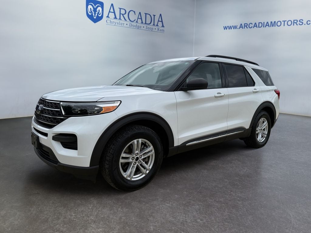 2020 Ford Explorer XLT in Oxford White — front three-quarter view