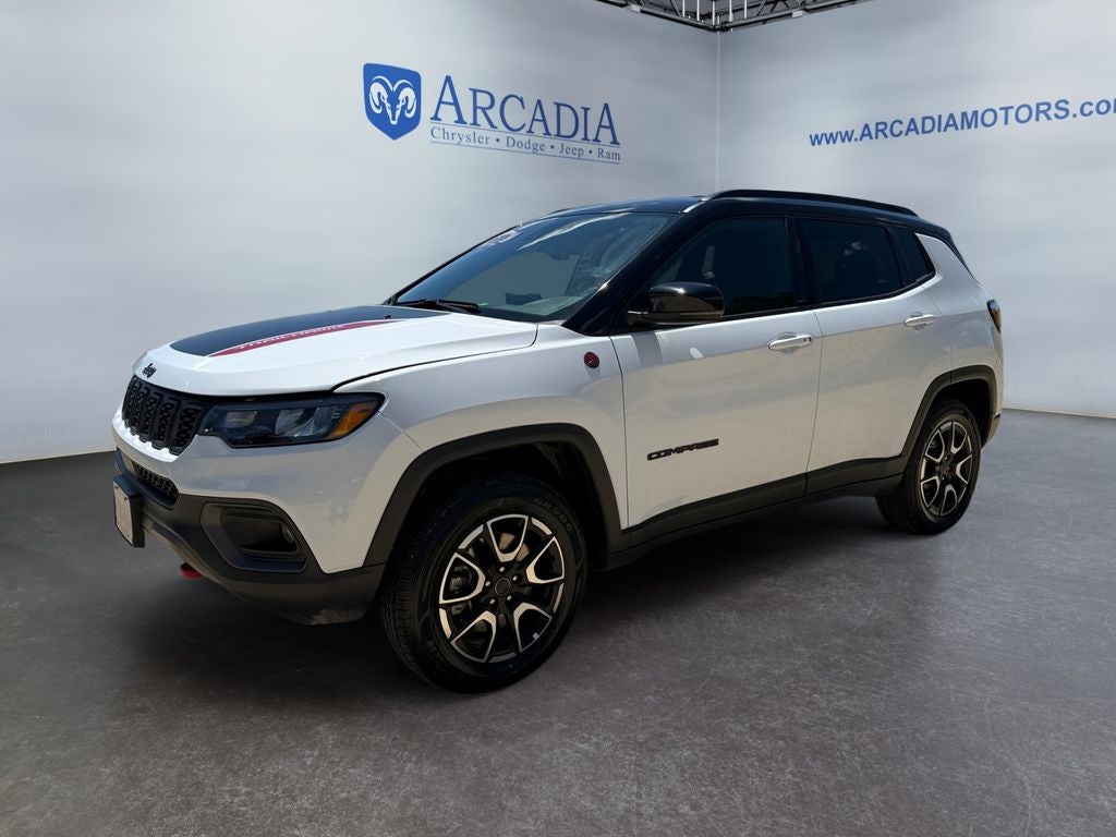 2025 Jeep Compass Trailhawk in Bright White Clearcoat — front three-quarter view