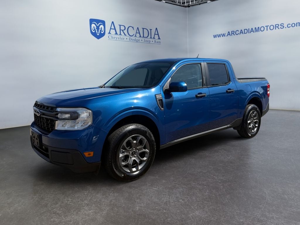 2023 Ford Maverick XLT in Blue Metallic — front three-quarter view
